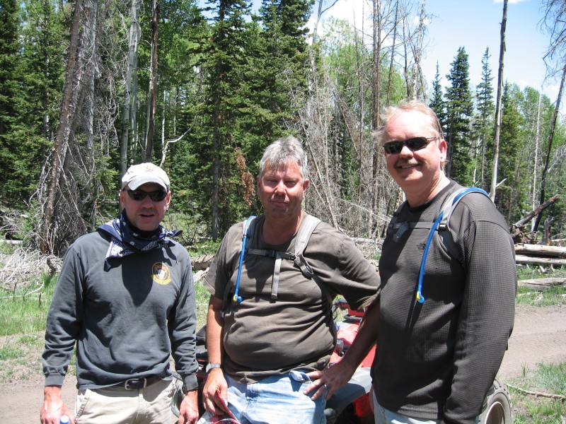 image0010 Do not let the long sleeves on these explorers fool you.  It was about 85.  Kojak, Mark and Ron.